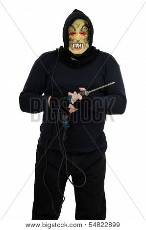 Maniac In A Mask Holds A Electric Drill