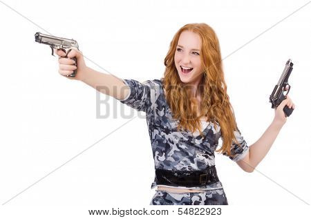 Young woman soldier with gun on white