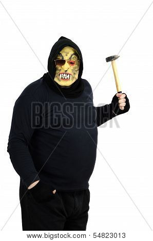 Maniac In A Mask Waves A Hammer