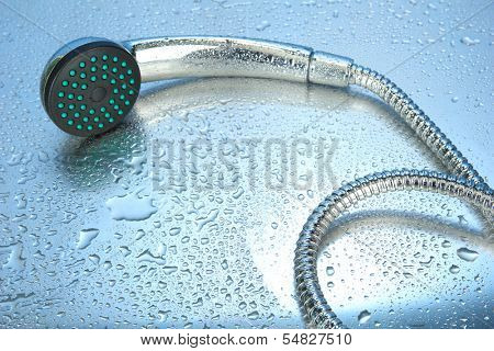Shower and drops, on blue background 