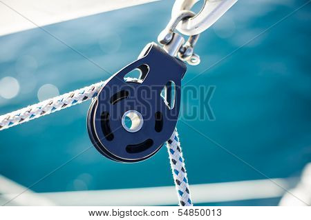 Closeup on yacht cord crank, rope holder