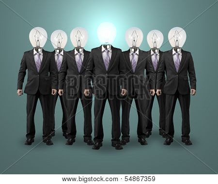 Lighting Bulb Head Businessman Standing With Group