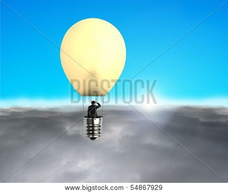 Man Taking Glowing Lamp Balloon Flying Over Clouds
