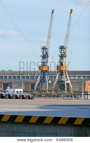 Cranes In A Harbour