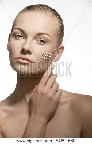 Woman Preparing Her Skin For The Make-up