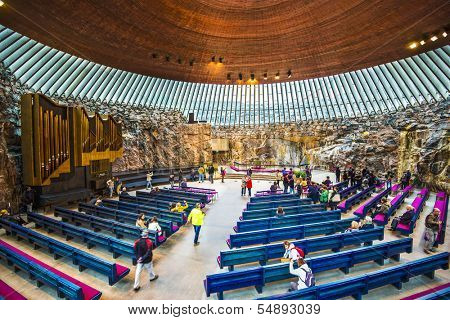 HELSINKI - SEPTEMBER 10: Interior of Temppeliaukio Church September 10, 2013 in Helsinki, Finland. The interior was excavated and built directly out of solid rock.
