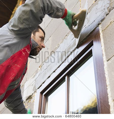 Man plastering