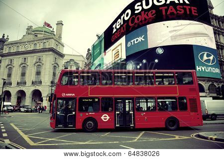 LONDON, UK - SEP 27: Piccadilly Circus street view on September 27, 2013 in London, UK. Built in 1819, it is the major shopping, entertainment areas and key tourist attractions in London.