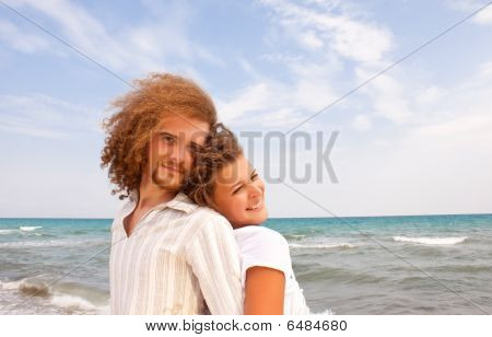 Beautiful Couple By The Sea