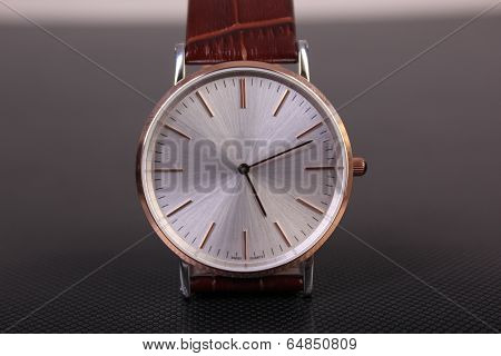 wristwatch with leather bracelet