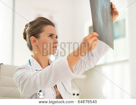 Medical Doctor Woman Looking On Fluorography