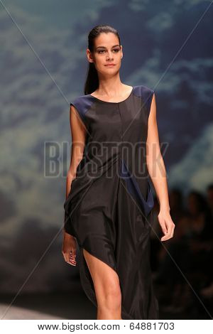 ZAGREB, CROATIA - MAY 09: Fashion model wearing clothes designed by Iva Karacic on the Zagreb Fashion Week on May 09, 2014 in Zagreb, Croatia.
