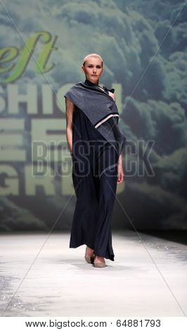 ZAGREB, CROATIA - MAY 09: Fashion model wearing clothes designed by Iva Karacic on the Zagreb Fashion Week on May 09, 2014 in Zagreb, Croatia.