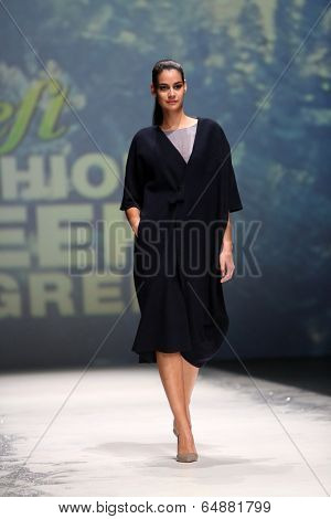 ZAGREB, CROATIA - MAY 09: Fashion model wearing clothes designed by Iva Karacic on the Zagreb Fashion Week on May 09, 2014 in Zagreb, Croatia.