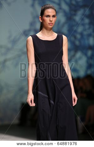 ZAGREB, CROATIA - MAY 09: Fashion model wearing clothes designed by Iva Karacic on the Zagreb Fashion Week on May 09, 2014 in Zagreb, Croatia.