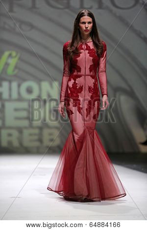 ZAGREB, CROATIA - MAY 09: Fashion model wearing clothes designed by Avaro Figlio on the Zagreb Fashion Week on May 09, 2014 in Zagreb, Croatia.