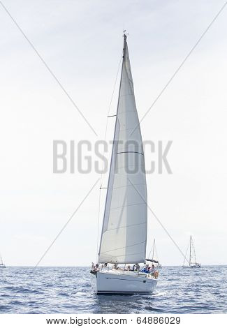 AEGEAN SEA, GREECE - APR 27, 2014: Unidentified sailboats participate in sailing regatta 