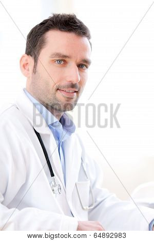 Portrait Of A Young Doctor Analysing A Radiography