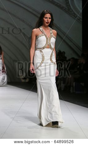 ZAGREB, CROATIA - MAY 09: Fashion model wearing clothes designed by Avaro Figlio on the Zagreb Fashion Week on May 09, 2014 in Zagreb, Croatia.