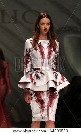 ZAGREB, CROATIA - MAY 09: Fashion model wearing clothes designed by Avaro Figlio on the Zagreb Fashion Week on May 09, 2014 in Zagreb, Croatia.