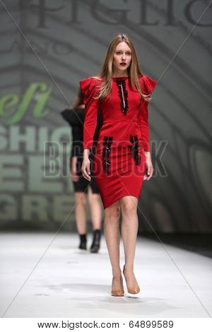 ZAGREB, CROATIA - MAY 09: Fashion model wearing clothes designed by Avaro Figlio on the Zagreb Fashion Week on May 09, 2014 in Zagreb, Croatia.