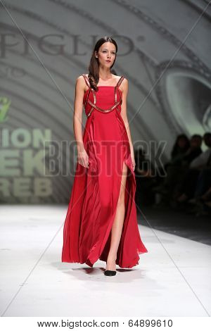 ZAGREB, CROATIA - MAY 09: Fashion model wearing clothes designed by Avaro Figlio on the Zagreb Fashion Week on May 09, 2014 in Zagreb, Croatia.
