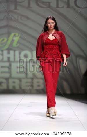 ZAGREB, CROATIA - MAY 09: Fashion model wearing clothes designed by Avaro Figlio on the Zagreb Fashion Week on May 09, 2014 in Zagreb, Croatia.
