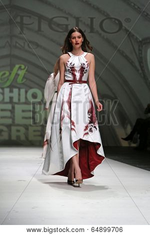ZAGREB, CROATIA - MAY 09: Fashion model wearing clothes designed by Avaro Figlio on the Zagreb Fashion Week on May 09, 2014 in Zagreb, Croatia.
