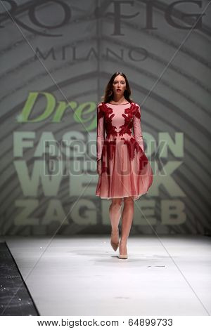 ZAGREB, CROATIA - MAY 09: Fashion model wearing clothes designed by Avaro Figlio on the Zagreb Fashion Week on May 09, 2014 in Zagreb, Croatia.
