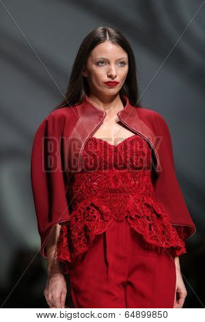 ZAGREB, CROATIA - MAY 09: Fashion model wearing clothes designed by Avaro Figlio on the Zagreb Fashion Week on May 09, 2014 in Zagreb, Croatia.