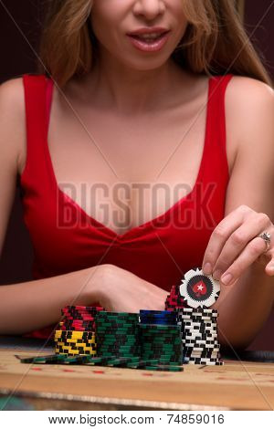 Handsome man and beautiful woman in casino