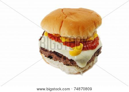 Delicious Beef Burger With Cheese And Condiments