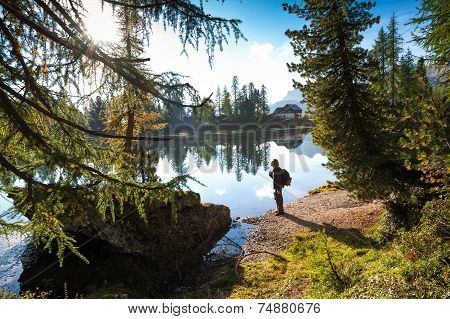 The hiker man at the beautiful Lago Di Federa See early morning
