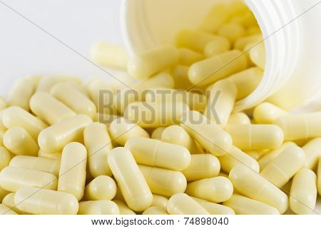 large group pills on white background