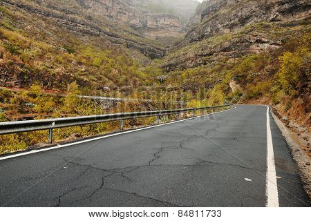Road in Parque Natural de Pilancones in Gran Canaria, Canary Islands, Spain