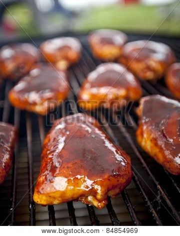 BBQ chicken thighs on a smoker 