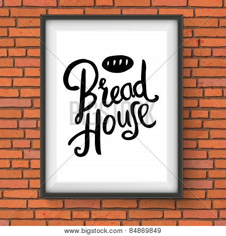 Bread House Bakery Sign on Red Brick Wall