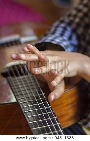 Acoustic Guitar And Girl's's Hands