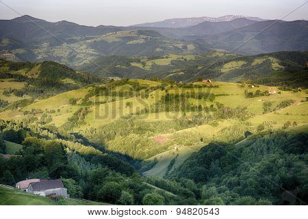 Pale of light. Morning on mountain hills. Holbav