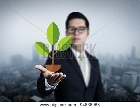 Illustration Plant Stems In Business Man Hand, New Business In The City Collection, Studio Shot