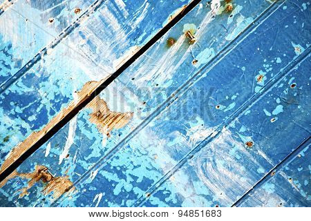 Stripped Paint In The Blue  And Rusty Nail