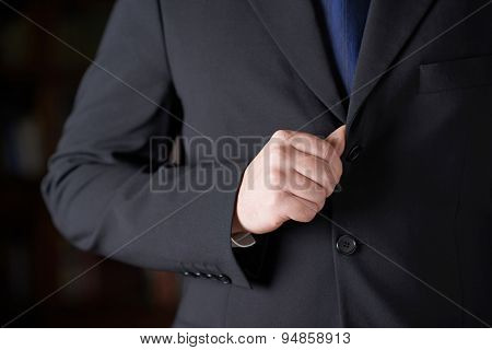 Fragment of a man in a business suit