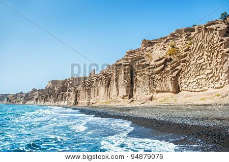 Beautiful Beach With Volcanic Mountains, Turquoise Water And Black Sand