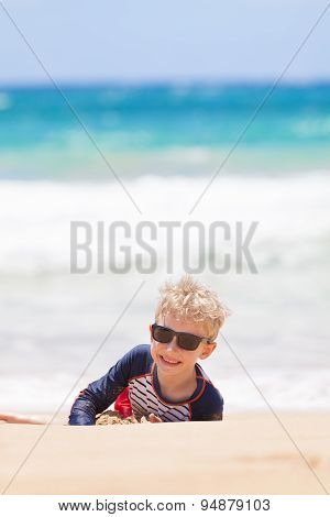 Boy At The Beach