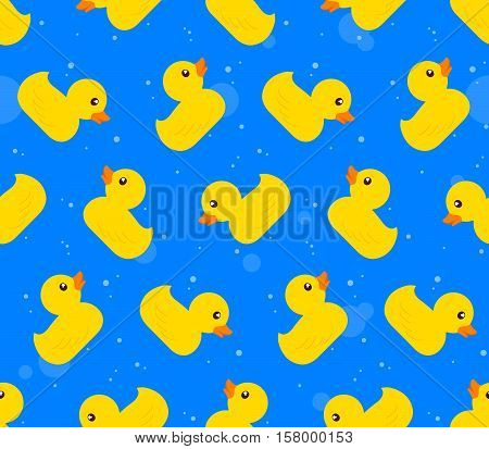 Seamless vector background pattern of yellow rubber ducks on a textured blue background arranged in rows of alternating icons facing up and down in square format for print textile and wallpaper