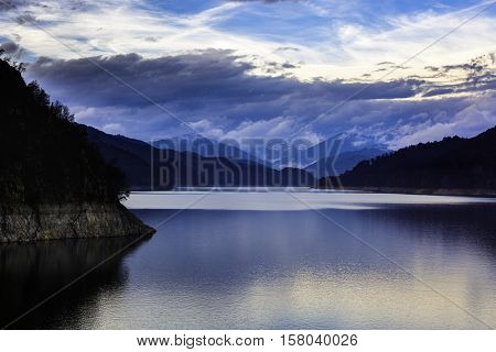 Landscape with dam lake Vidraru in Romanian mountains in the winter