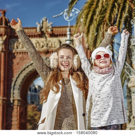 Mother And Child Near Arc De Triomf In Barcelona Rejoicing