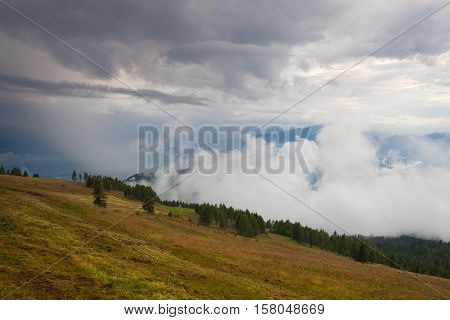 Dramatic evening in Gerlitzen Apls before stormAustria.Inverse weather and view of the mountains in Slovenia.