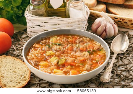 Nutrient soup with meat, rice and vegetables - mastava (uzbek kitchen).