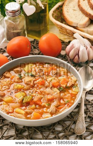 Nutrient soup with meat, rice and vegetables - mastava (uzbek kitchen).